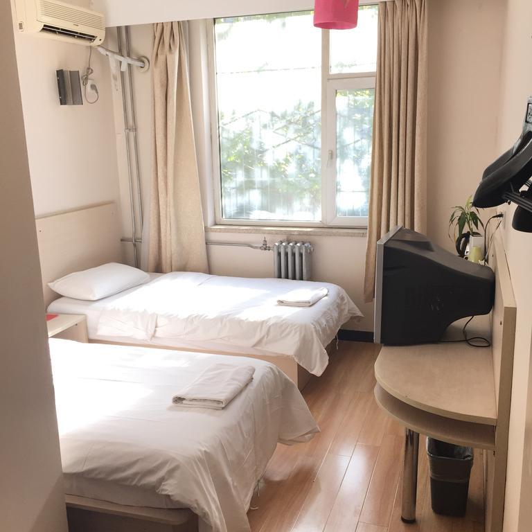 Beijing Sanlitun Hostel Rom bilde