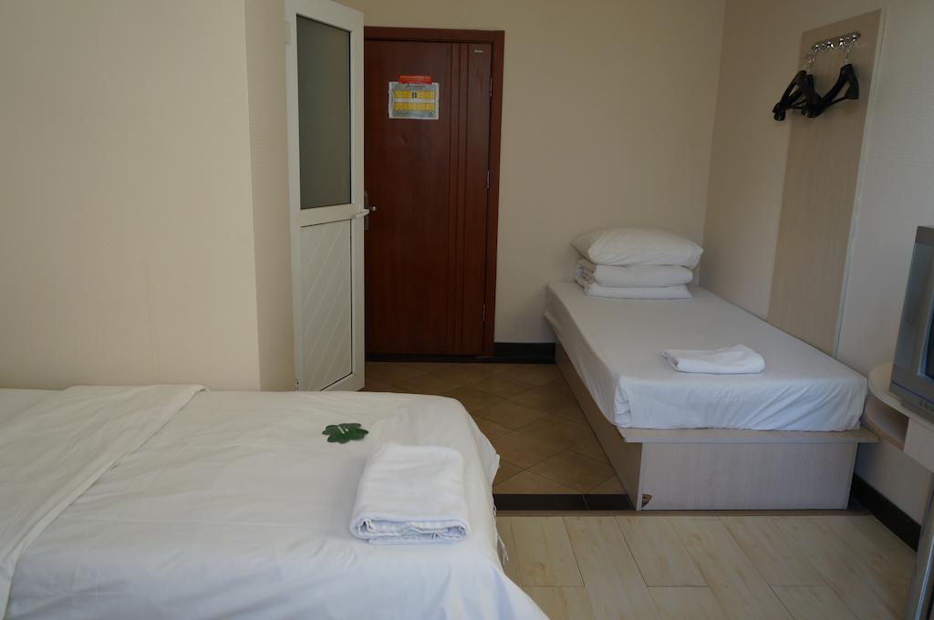 Beijing Sanlitun Hostel Rom bilde