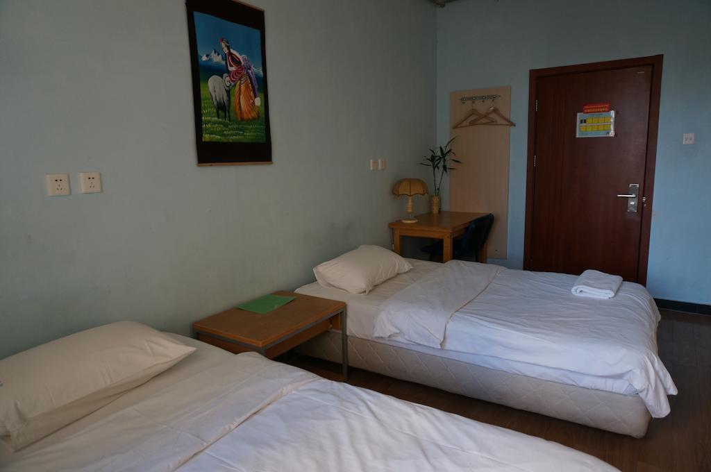 Beijing Sanlitun Hostel Rom bilde