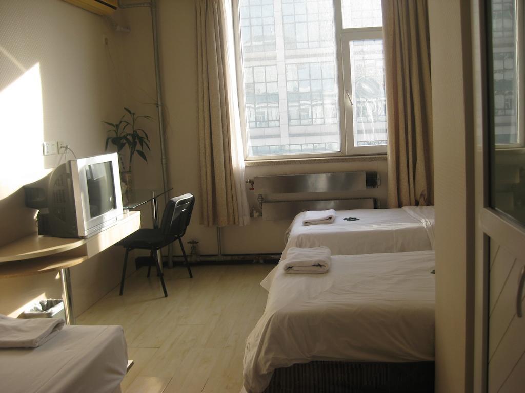 Beijing Sanlitun Hostel Rom bilde