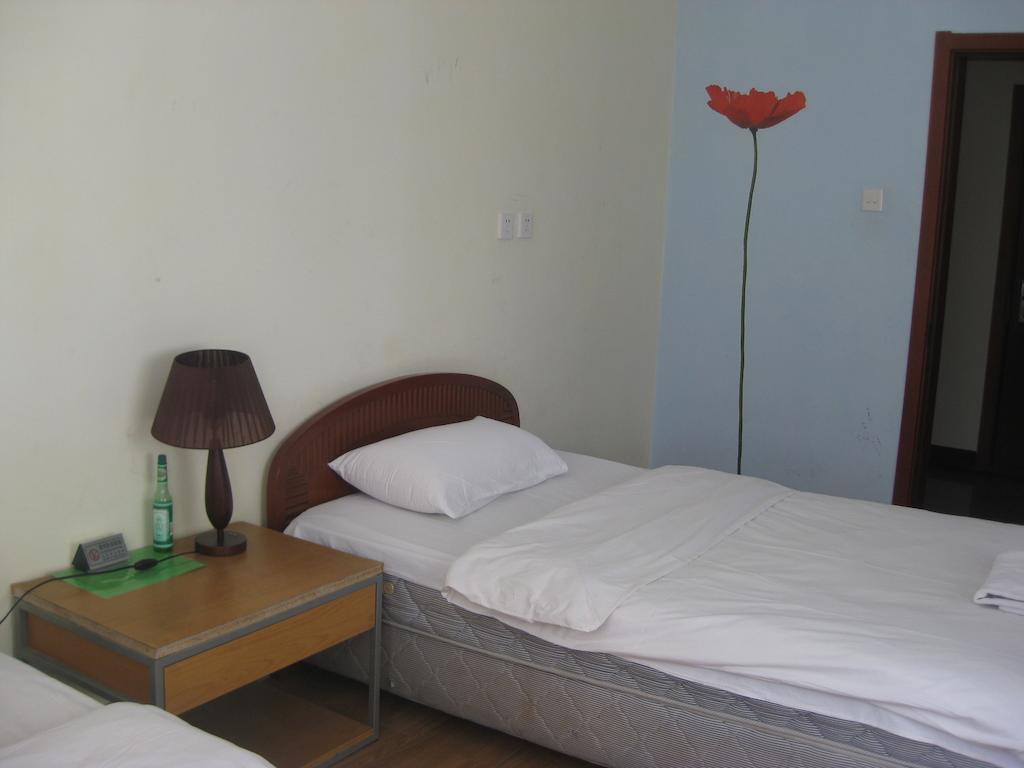 Beijing Sanlitun Hostel Rom bilde