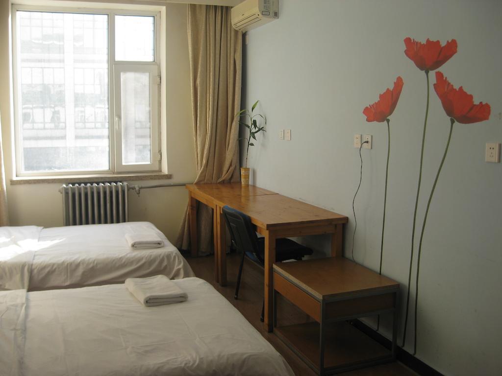 Beijing Sanlitun Hostel Rom bilde